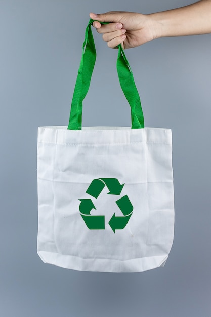 Download Free Man Holding Eco Shopping Bag With Copy Space For Text Use our free logo maker to create a logo and build your brand. Put your logo on business cards, promotional products, or your website for brand visibility.