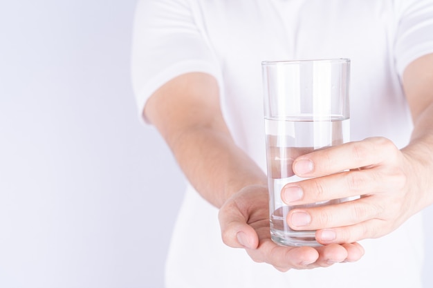 Premium Photo Man Holding Glass Of Water Isolated Grey Background Clean Drinking Water In 3677