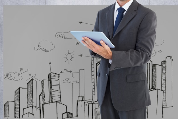 Man in suit with a tablet and background of a city drawn Free Photo Man in suit with a tablet and background of a city drawn Free Photo