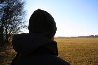 Man looking out over landscape Photo | Free Download