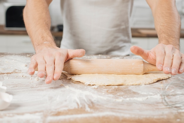 Free Photo | Man making pizza dough