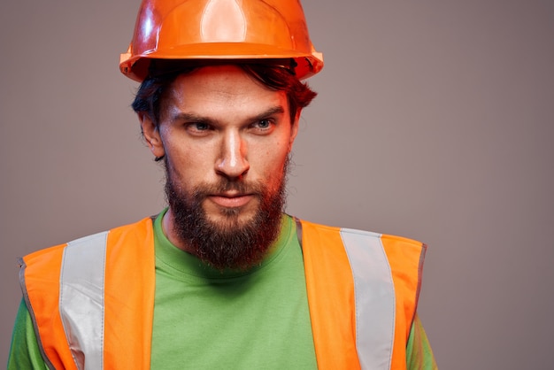 Premium Photo | Man in orange paint construction security professional