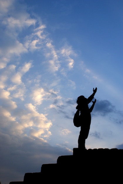 Premium Photo | Man praying alone at sunset mountains travel lifestyle ...