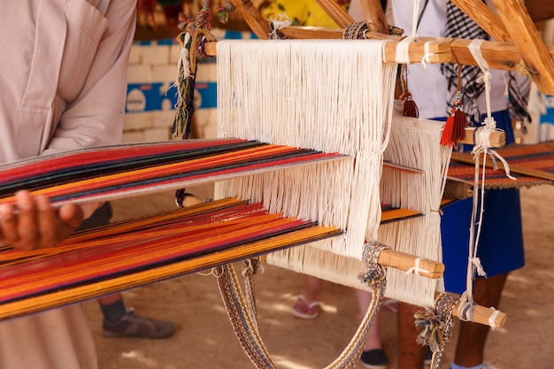 Man produces the fabric Premium Photo