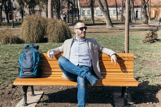 Free Photo | Man resting on bench