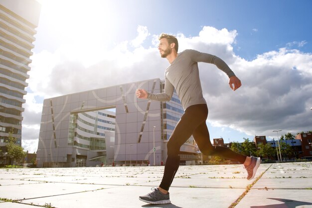 Premium Photo | Man running in the city