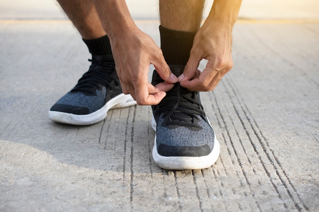 Premium Photo | Man running on road sport exercise