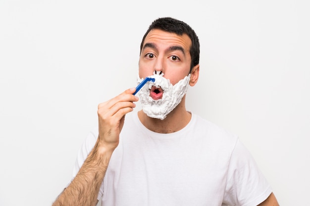 Premium Photo | Man shaving his beard