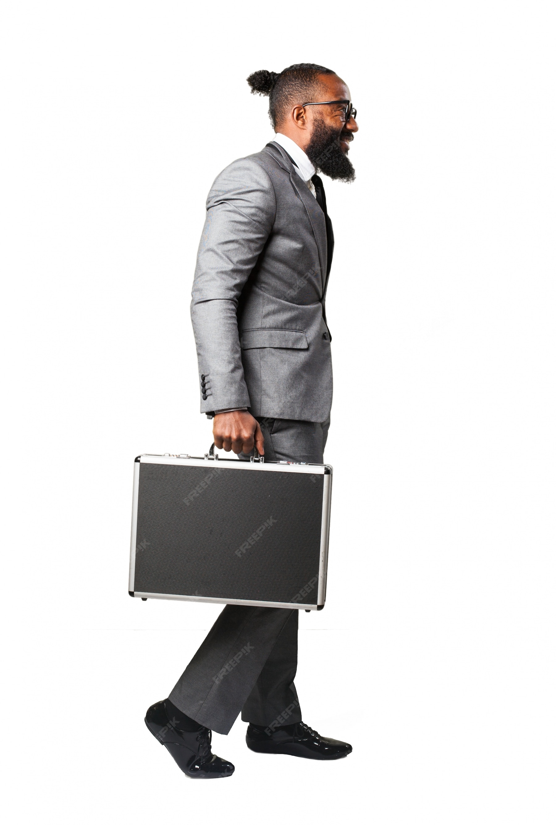 Free Photo | Man in suit and a briefcase