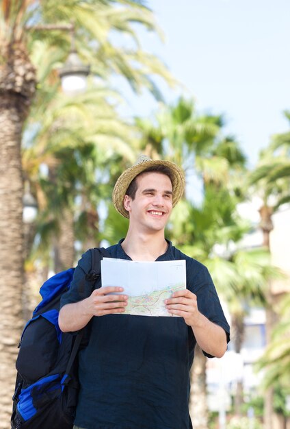 Premium Photo | Man Traveling With Bag And Map