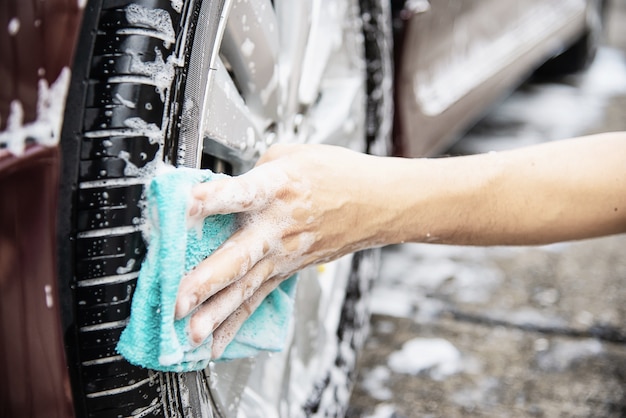 Man wash car using shampoo Free Photo