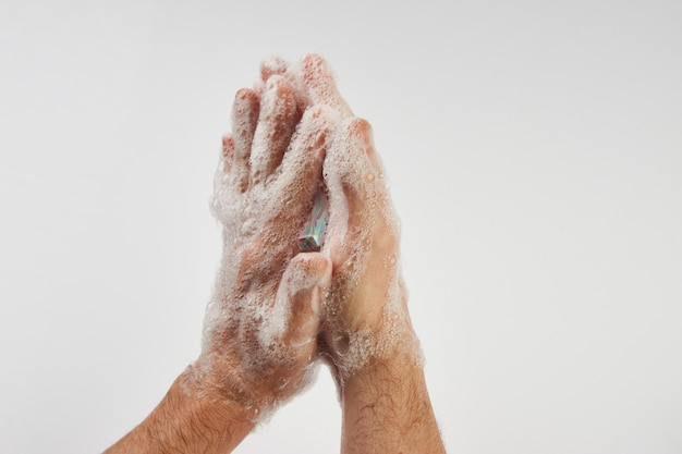 premium-photo-man-washing-dirty-hands-with-soap-close-up