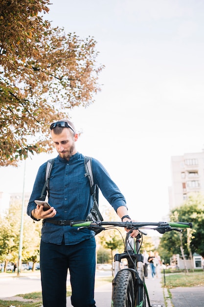 Free Photo | Man with bike