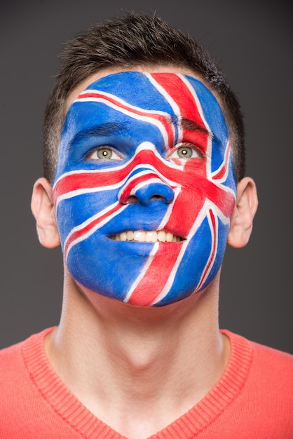 Download Free Man With Flag Painted On His Face To Show Uk Premium Photo Use our free logo maker to create a logo and build your brand. Put your logo on business cards, promotional products, or your website for brand visibility.