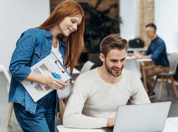 Man And Woman Discussing A Business Project In A Meeting Free Picture On Freepik