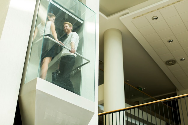 Premium Photo | Man and woman in the elevator