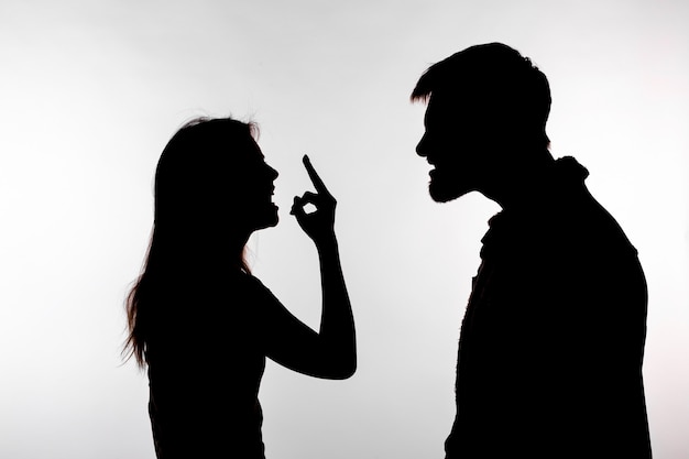 Premium Photo | Man and woman expressing domestic violence in studio ...