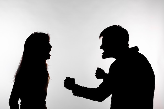 Premium Photo | Man and woman expressing domestic violence in studio ...