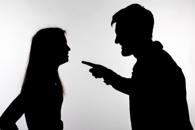 Premium Photo | Man and woman face to face screaming shouting each ...