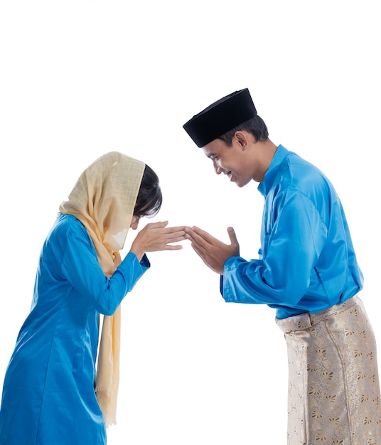 premium-photo-man-and-woman-greeting-in-muslim-traditional-way