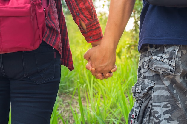 premium-photo-man-and-woman-walking-hand-in-hand-two-hand