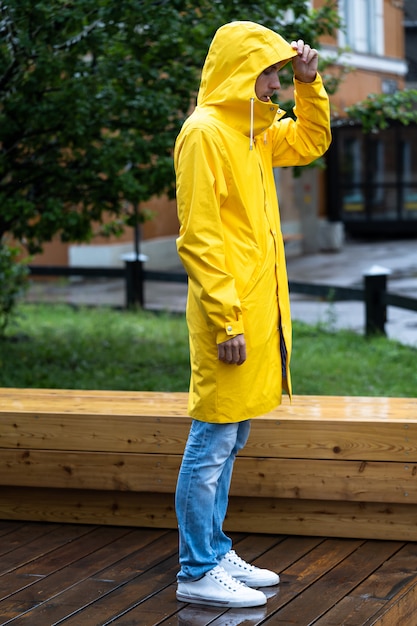 yellow raincoat man