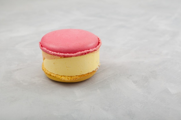 Premium Photo Mango Passion Fruit Ice Cream With Macarons Or Macaroons On Grey