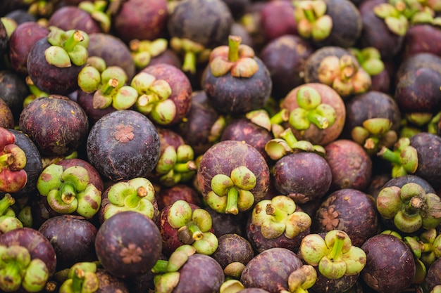 Premium Photo | Mangosteen tropical fruit sale at street market in ...