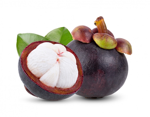 Premium Photo | Mangosteen with leaves on white wall.