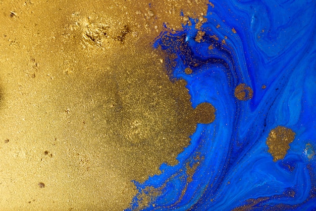 Marbled blue and gold abstract background. liquid marble ...