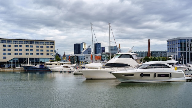 Premium Photo Marina With Large Yachts Next To Office Buildings Tallinn Estonia