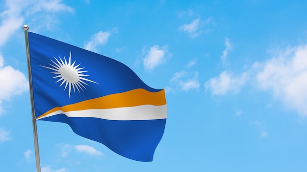 マーシャル諸島の旗がポールに 青空 マーシャル諸島の国旗 プレミアム写真