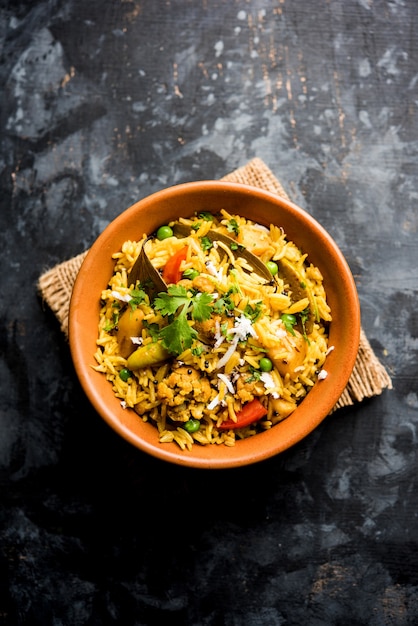 Premium Photo | Masala rice or masale bhat - is a spicy vegetable fried ...