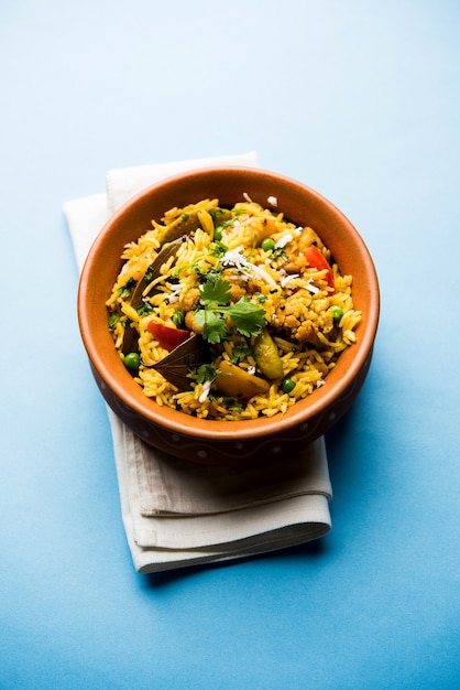 Premium Photo | Masala rice or masale bhat - is a spicy vegetable fried ...