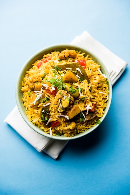 Premium Photo | Masala rice or masale bhat - is a spicy vegetable fried ...