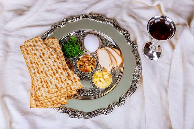 Premium Photo | Matzo for passover with seder on plate on table close up