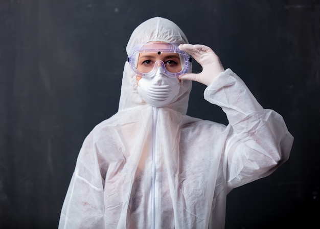 Medic woman wearing protective clothing against the virus Premium Photo