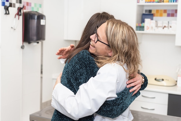 Premium Photo Medical Care Young Female Doctor Hugging Patient 