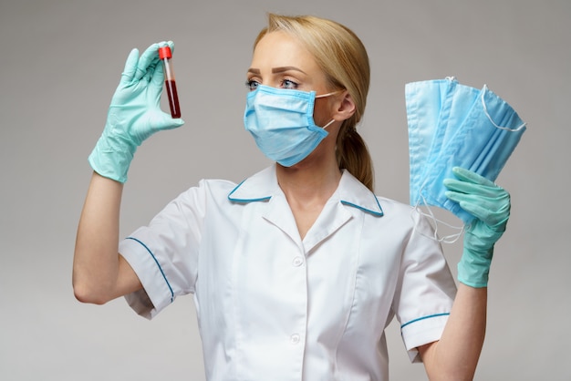 Premium Photo | Medical doctor nurse woman wearing latex gloves