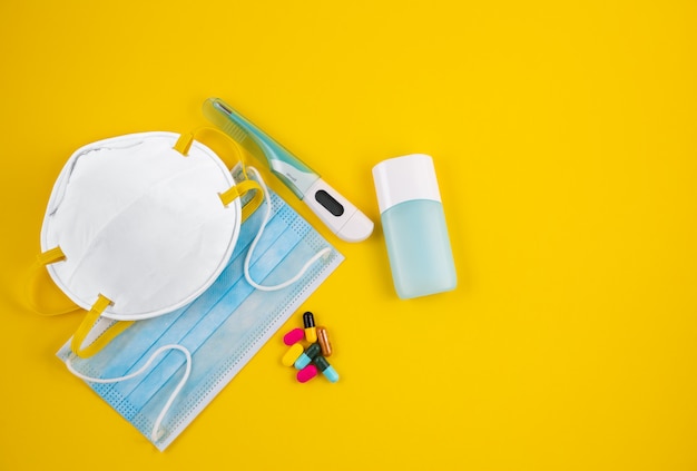 Premium Photo | Medical hygiene products on yellow table