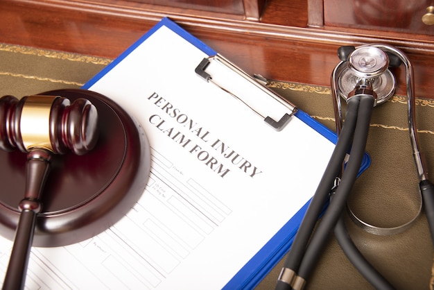 premium-photo-medical-malpractice-claim-form-for-lawyers-calculation