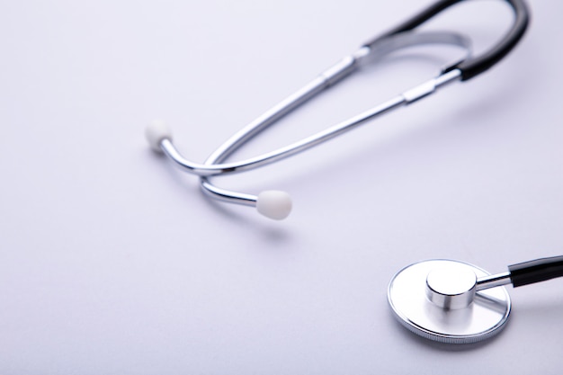 Premium Photo | Medical stethoscope on a grey background. health care