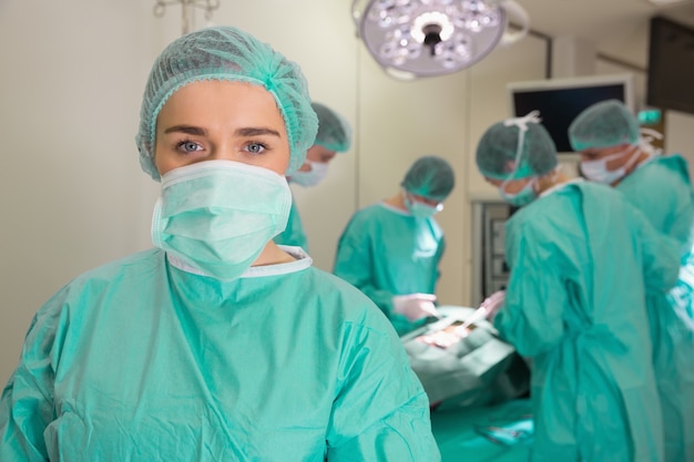 Premium Photo | Medical students practicing surgery on model