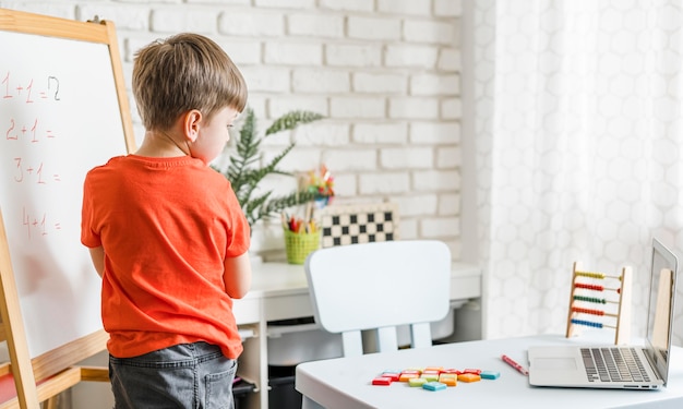 Free Photo | Medium shot kid with board