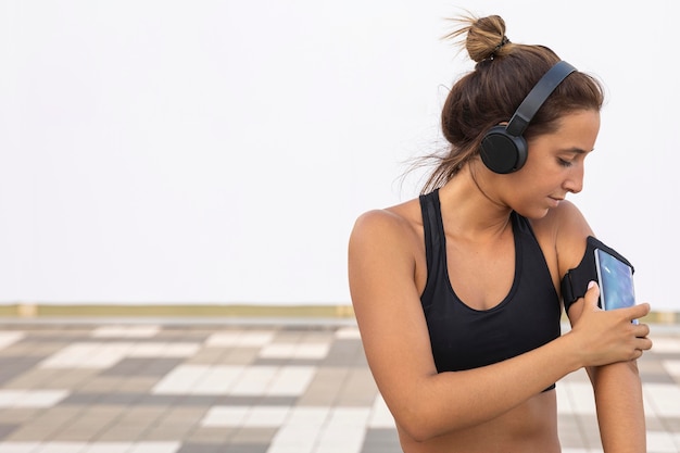 Free Photo | Medium shot woman checking phone