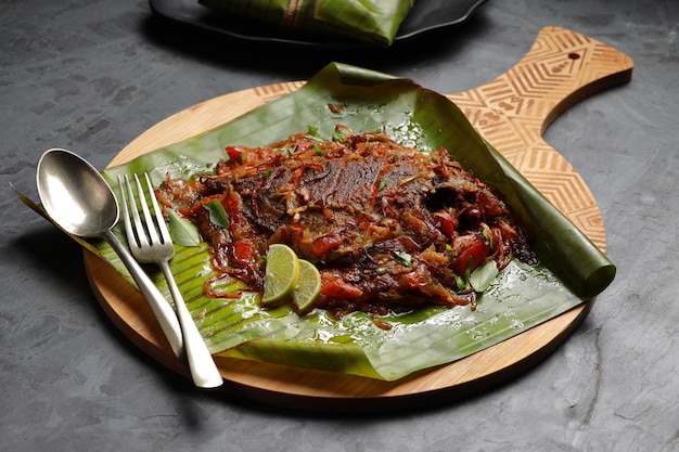 Premium Photo | Meen pollichathu or fish pollichathu, tasty kerala dish ...