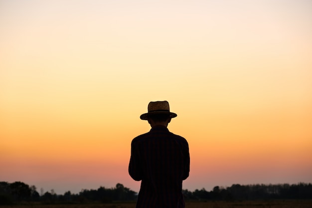 Download Free Men Wearing Striped Shirts And Straw Hats Stand At Sunset Premium Photo Use our free logo maker to create a logo and build your brand. Put your logo on business cards, promotional products, or your website for brand visibility.