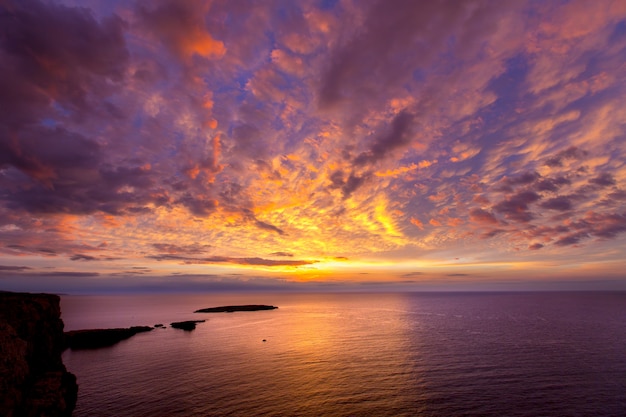 Premium Photo | Menorca sunset in cap de caballeria cape at balearic