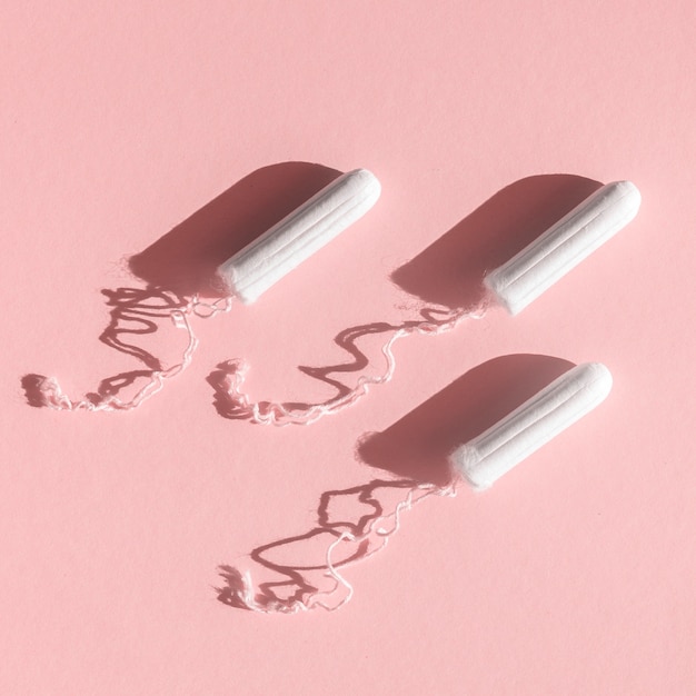 Free Photo | Menstrual Tampons With Thread On Pink Background