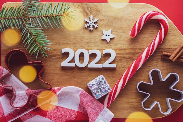 Christmas 2022 Candy Premium Photo | Merry Christmas 2022 Numbers 2022 With New Years Candy And  Christmas Tree New Year Concept